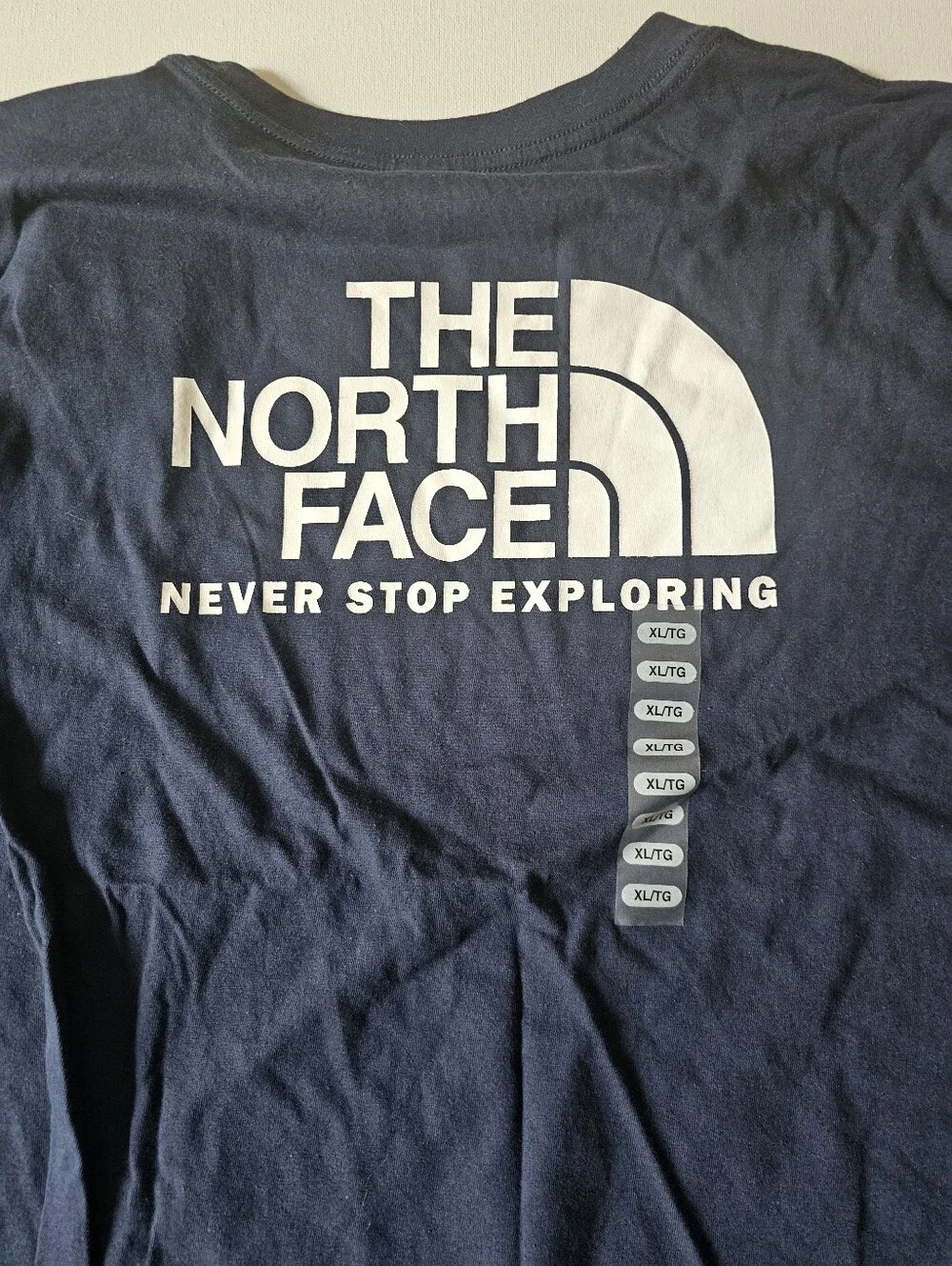 The North Face Standard Fit XL Dark Blue TShirt Never Stop Exploring Hiking New - Picture 5 of 5